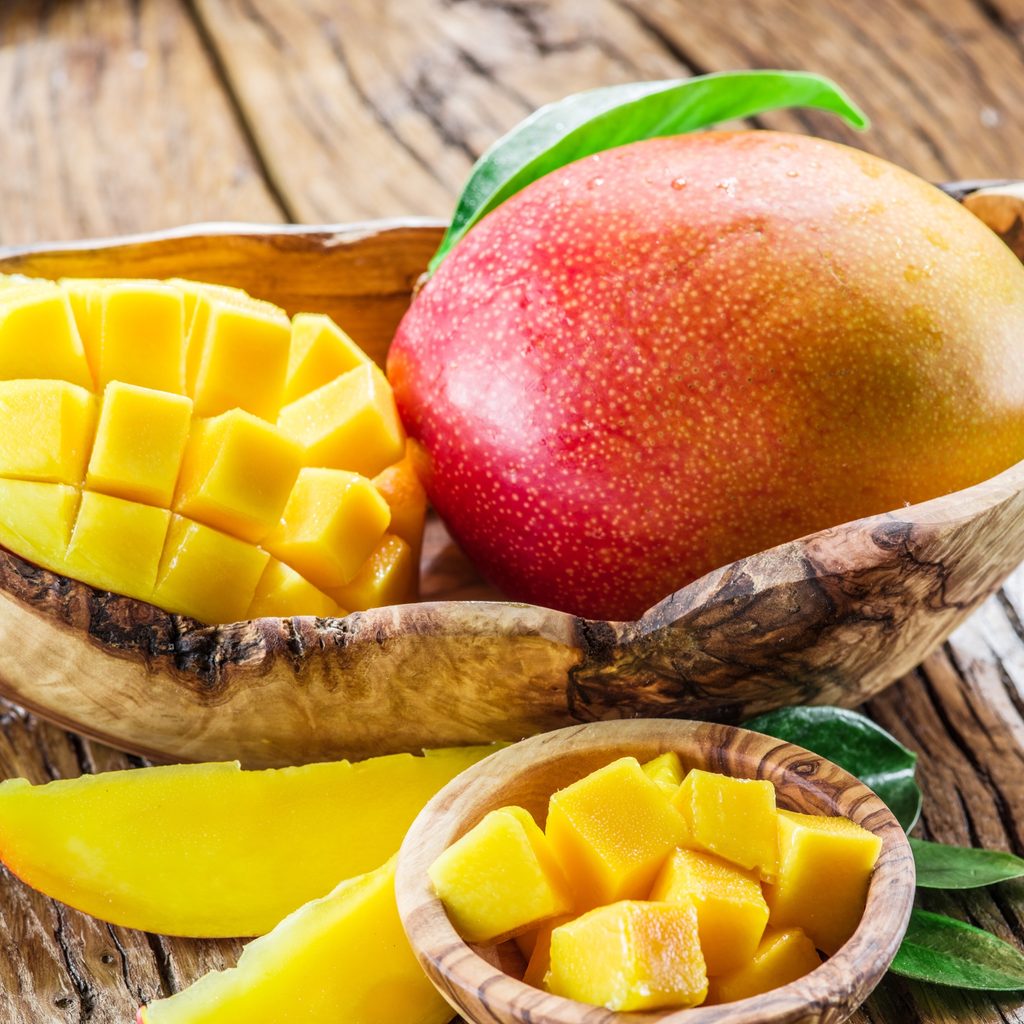 mango in basket with sliced mango