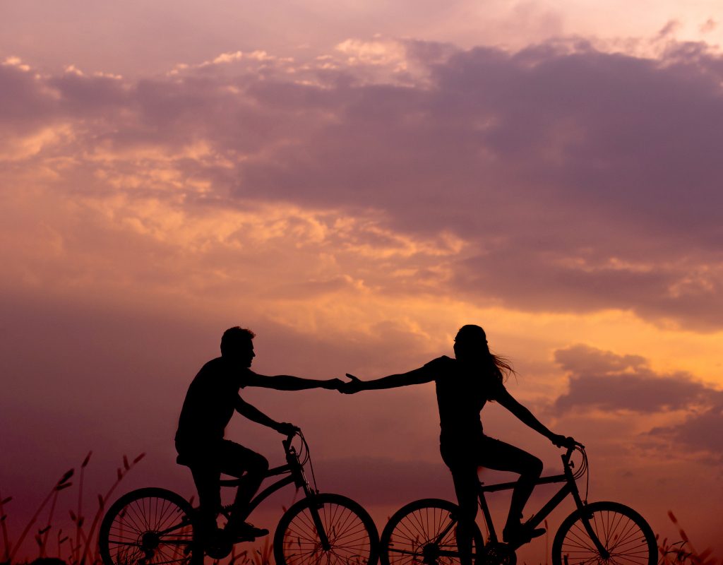 A couple on bikes