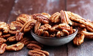 pecans-on-rustic-wooden-table