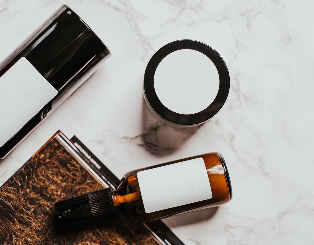 Skin care products laid out on a table.