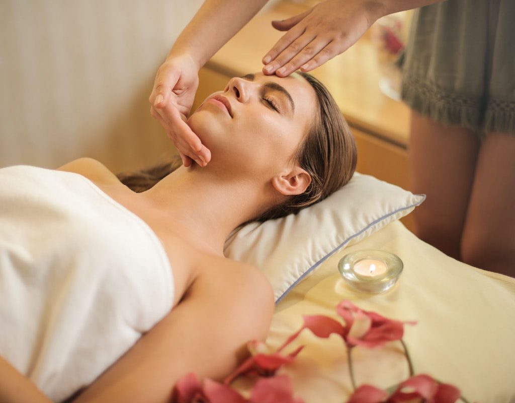 A woman relaxing at a spa.