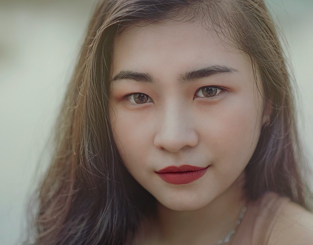 A woman with perfectly done eyebrows.