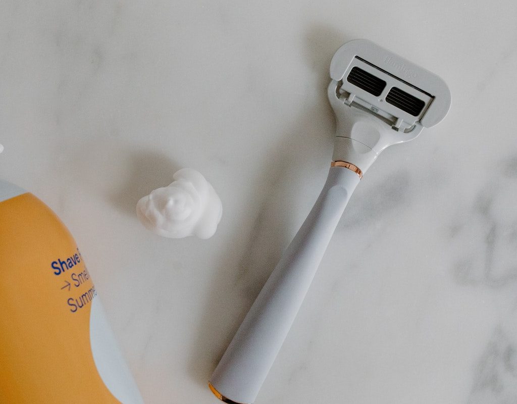 A razor and shaving cream.