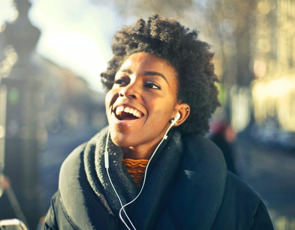 walking-woman-listening-to-podcast