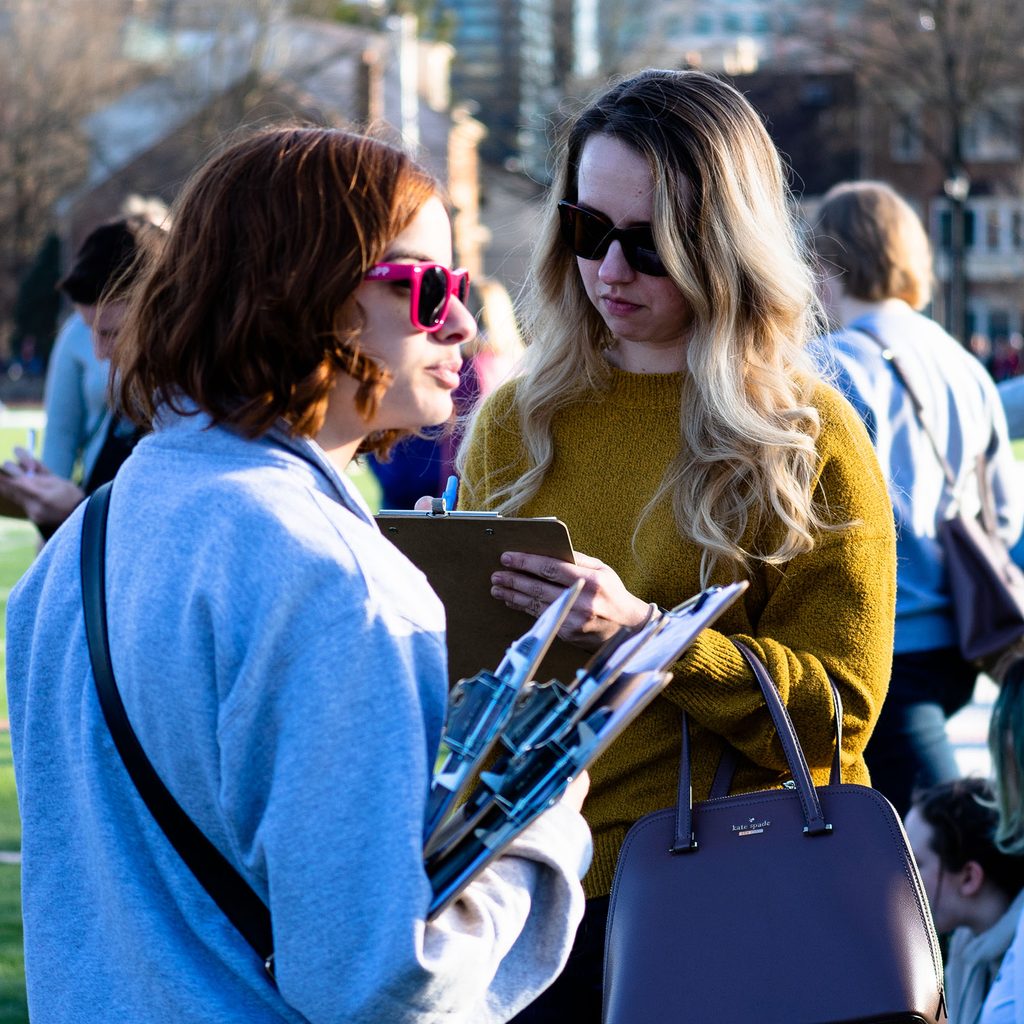 Woman signing a petition