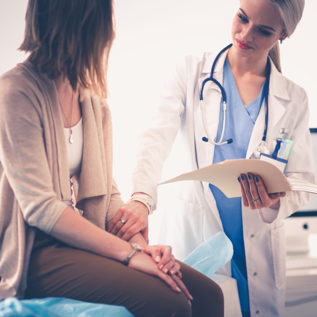 woman talks to her doctor
