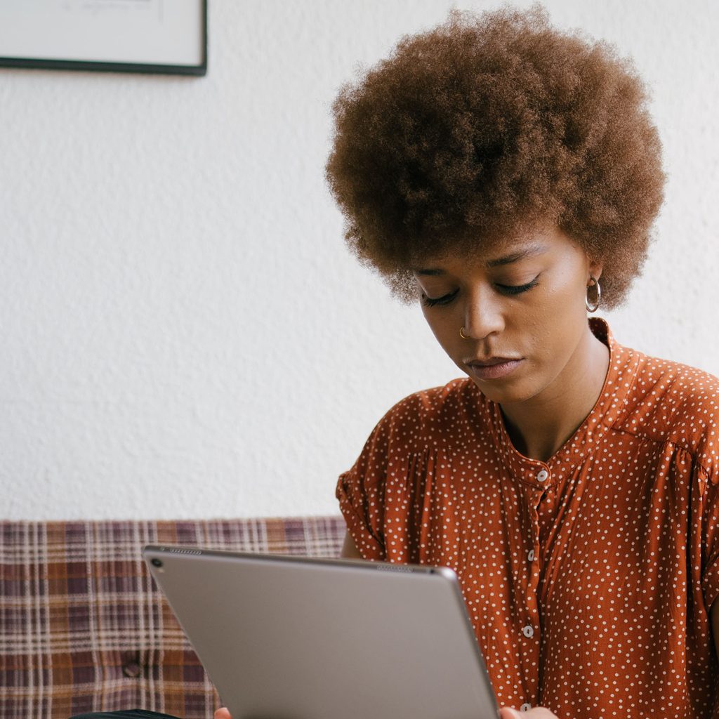 Woman working from home in a polished blouse