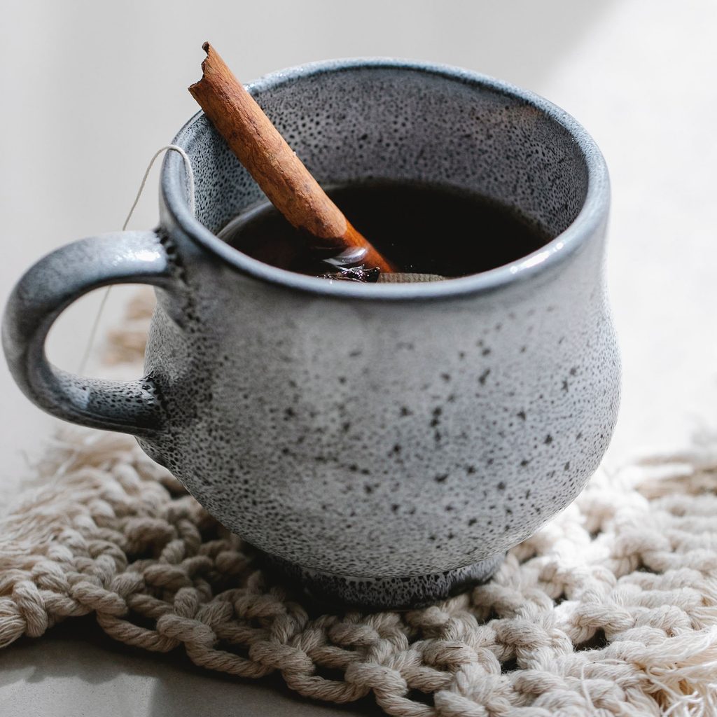 Cup of tea with cinnamon