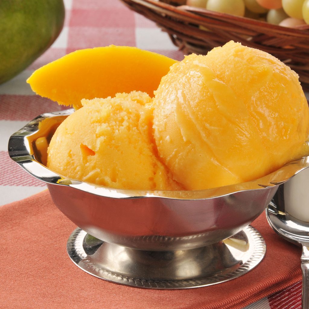 Mango sorbet in a silver dish