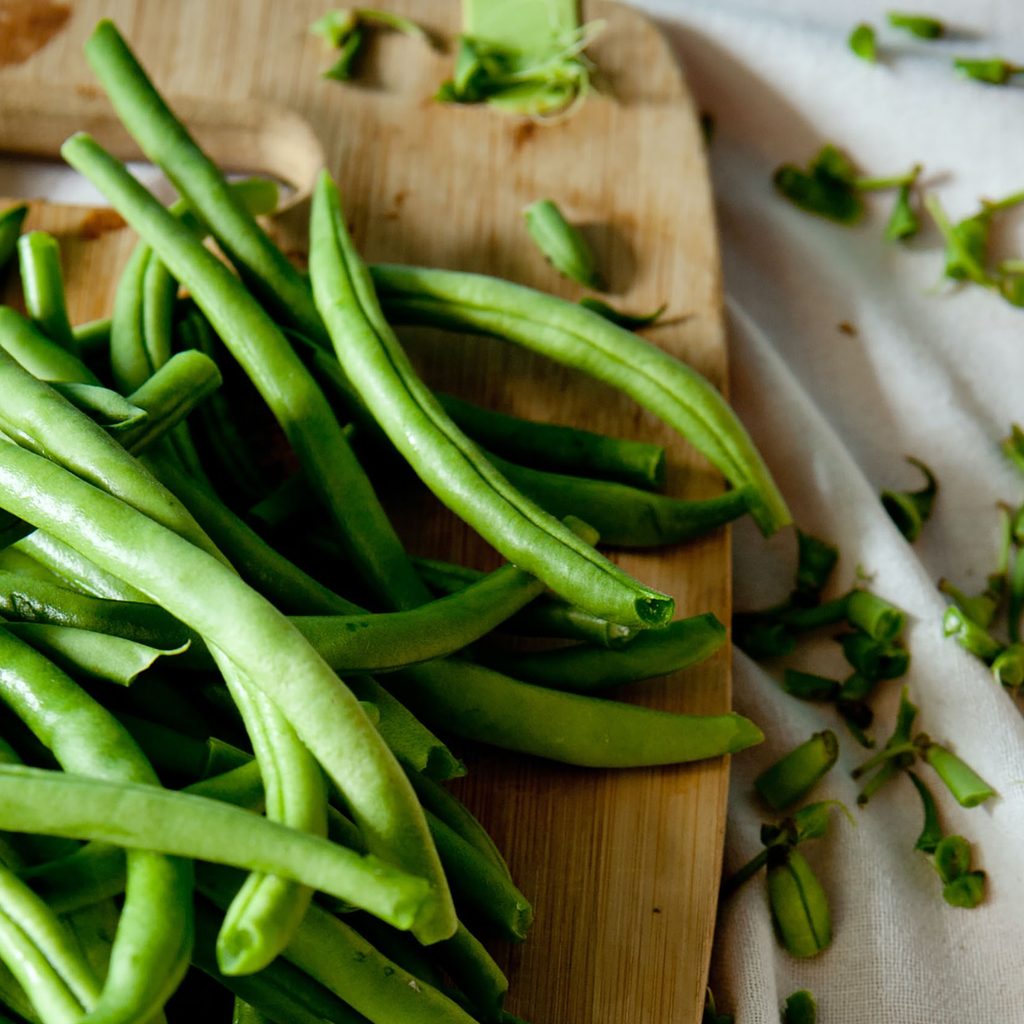 Green beans on a cutting board