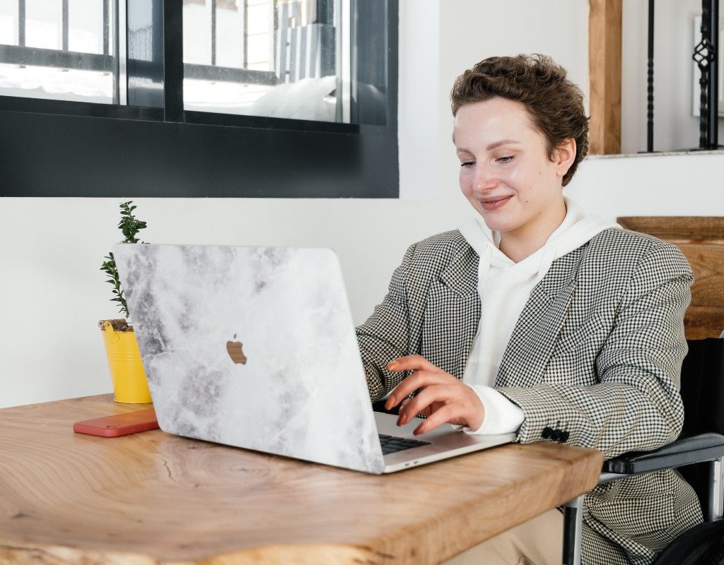 woman working from a coffeeshop