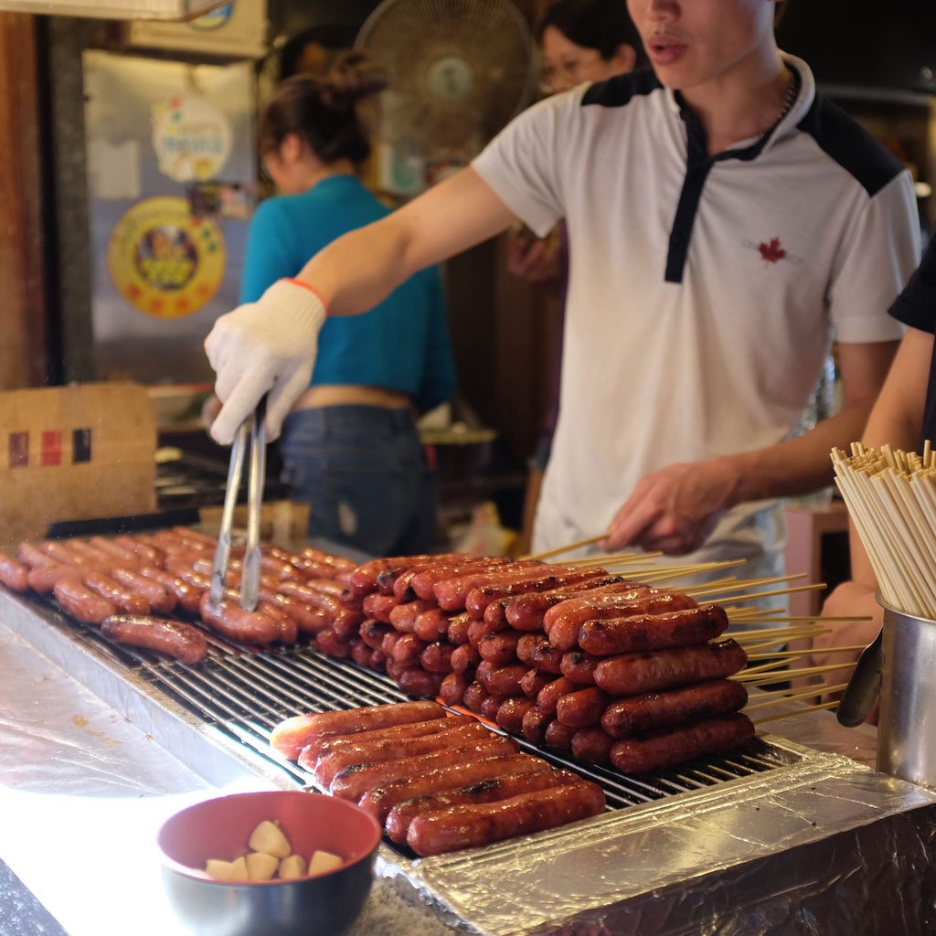 Street vendor cooks sausages in Taiwan