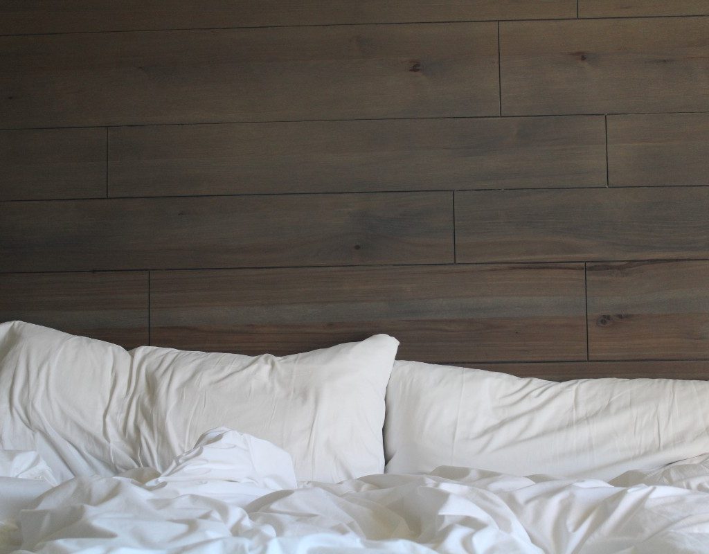 two pillows on a made bed