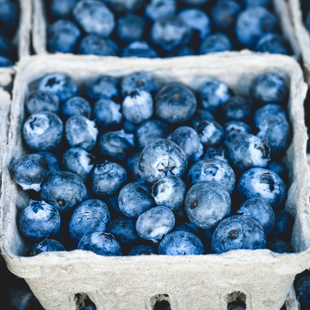 Fresh blueberries in containers