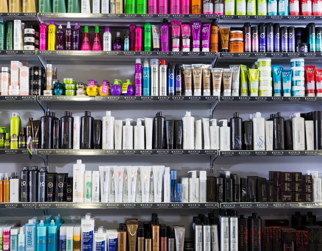 Hair care products on a shelf at the store.
