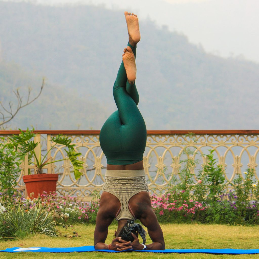 Woman doing a yoga headstand