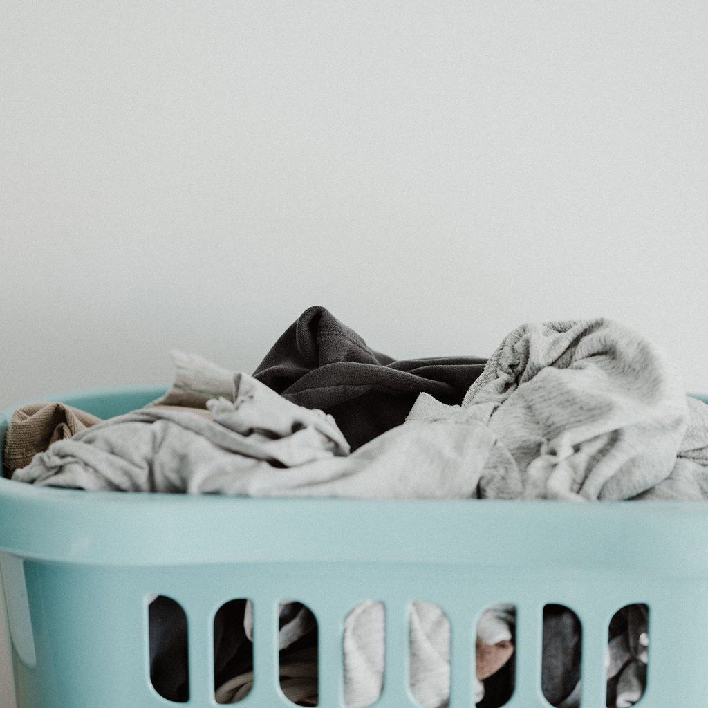 Blue basket full of laundry