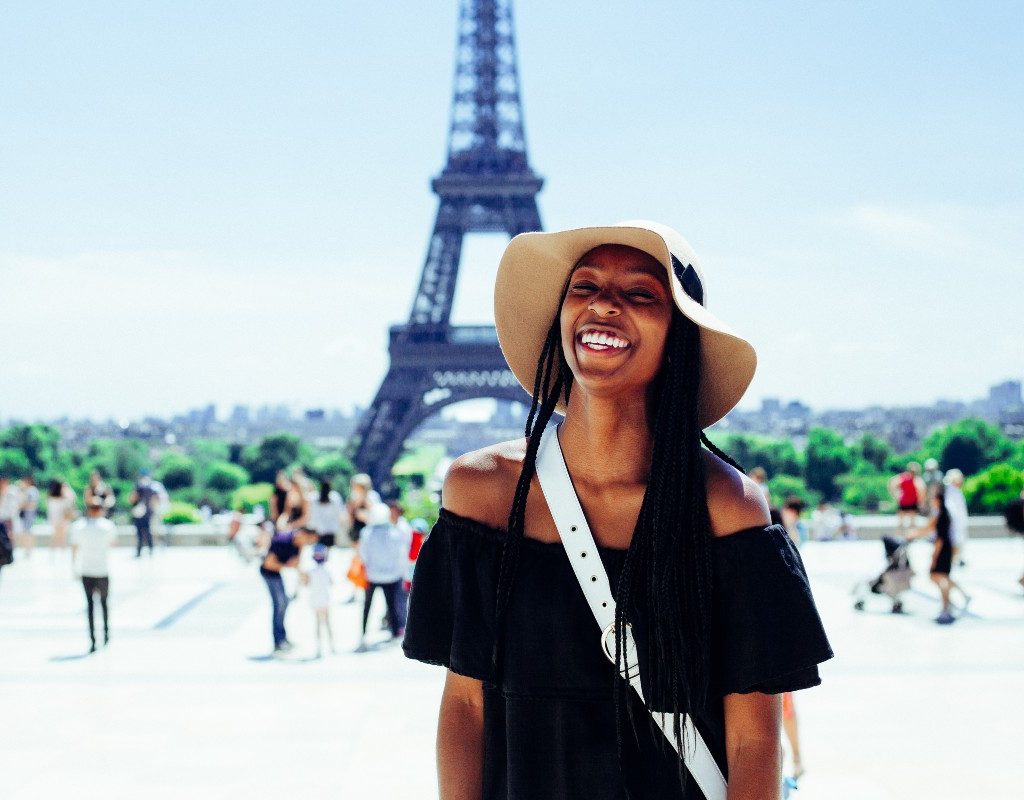 a happy woman in paris