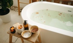 A bath all set up to add bath salts to it.