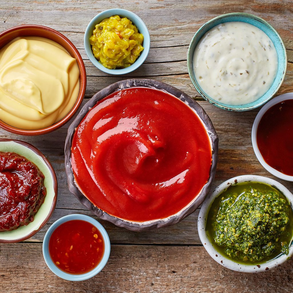 Variety of condiments in serving bowls