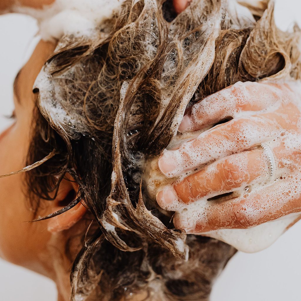 Woman washing her hair