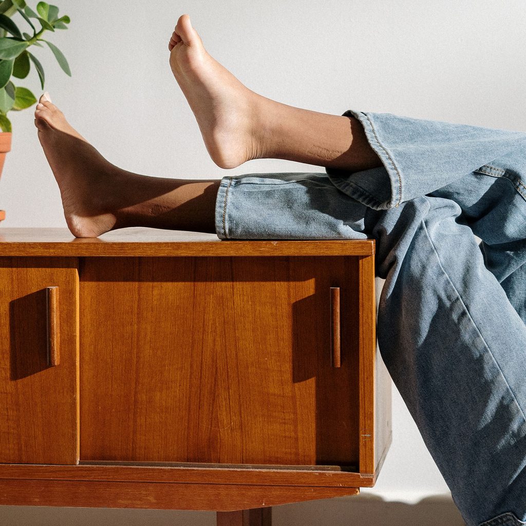 Woman wearing loose jeans