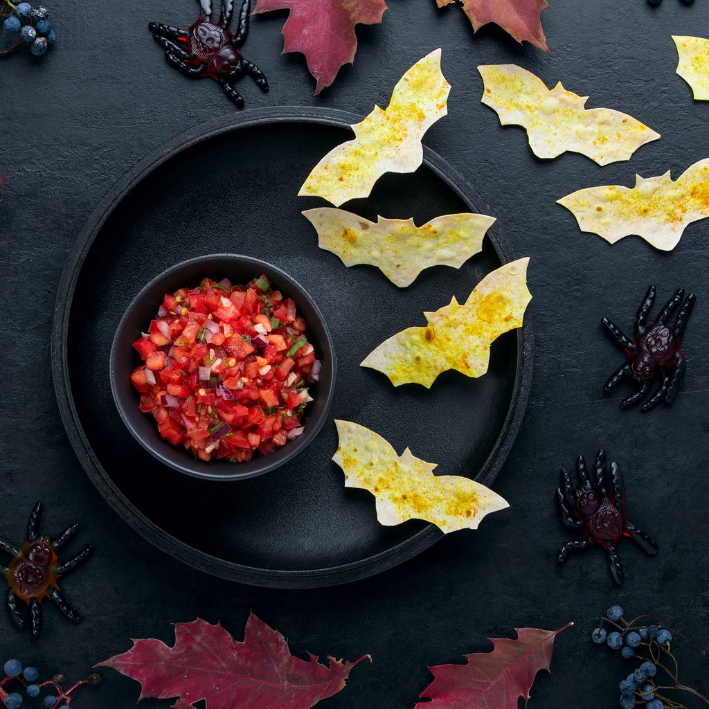 Bat-shaped tortilla chips and salsa