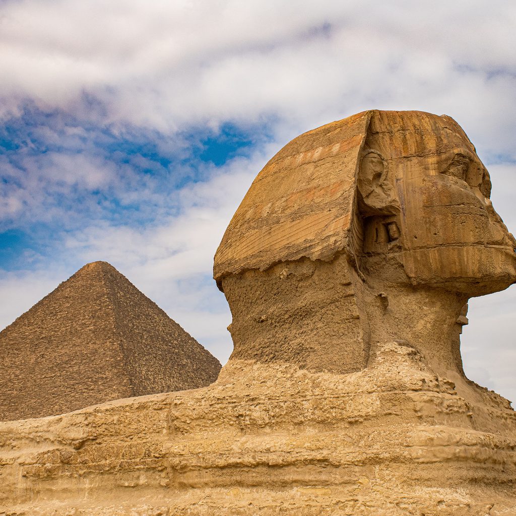 The Great Sphinx of Giza and a pyramid