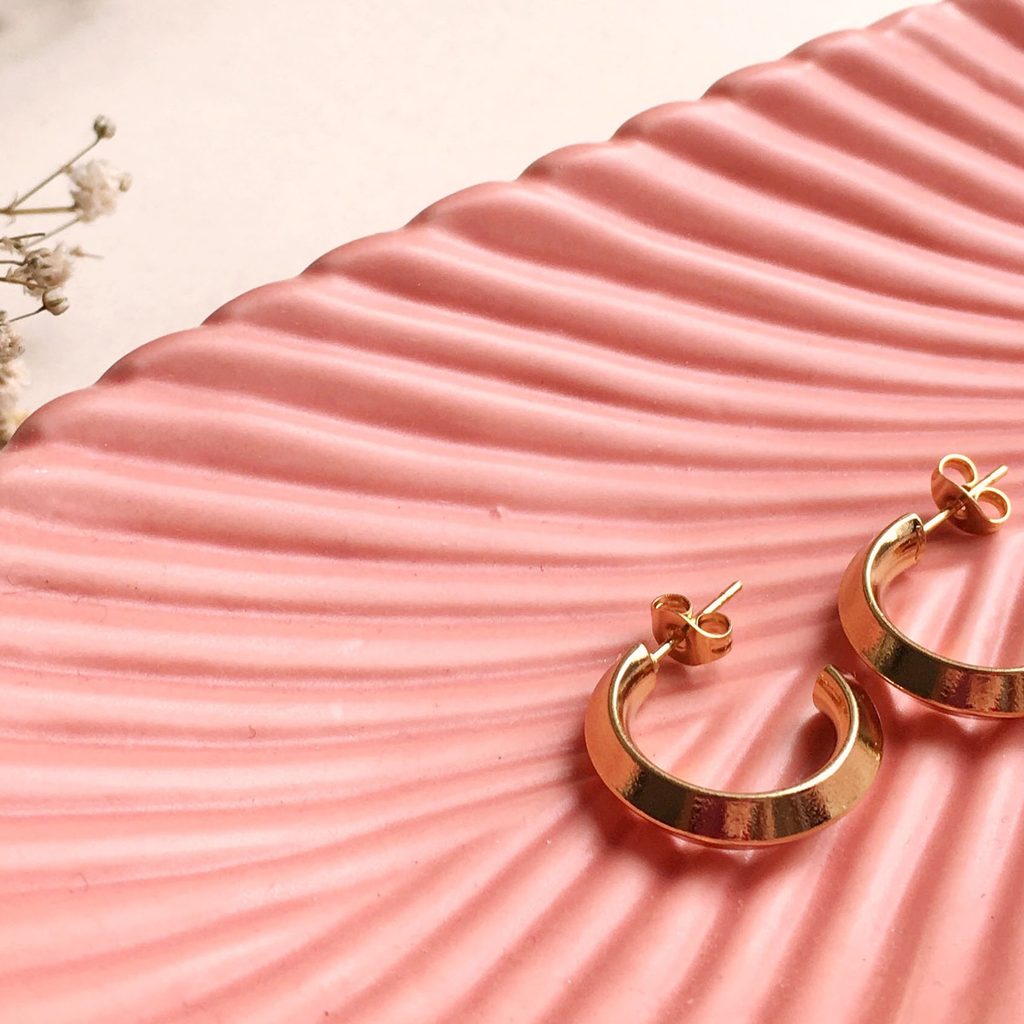 Set of earrings on a jewelry tray