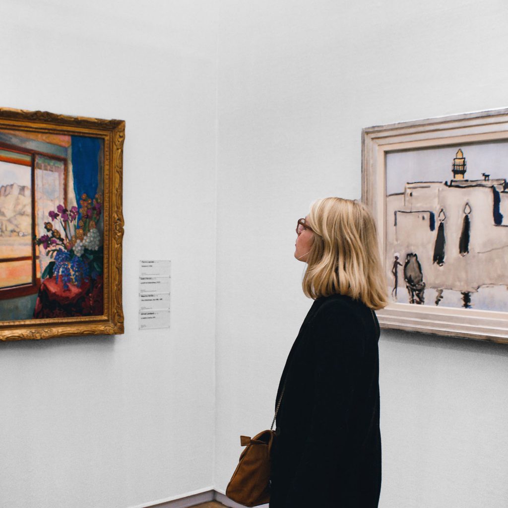 Woman viewing art at Le Centre Pompidou in Paris