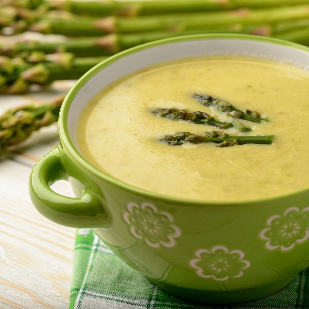 Asparagus soup in a green bowl