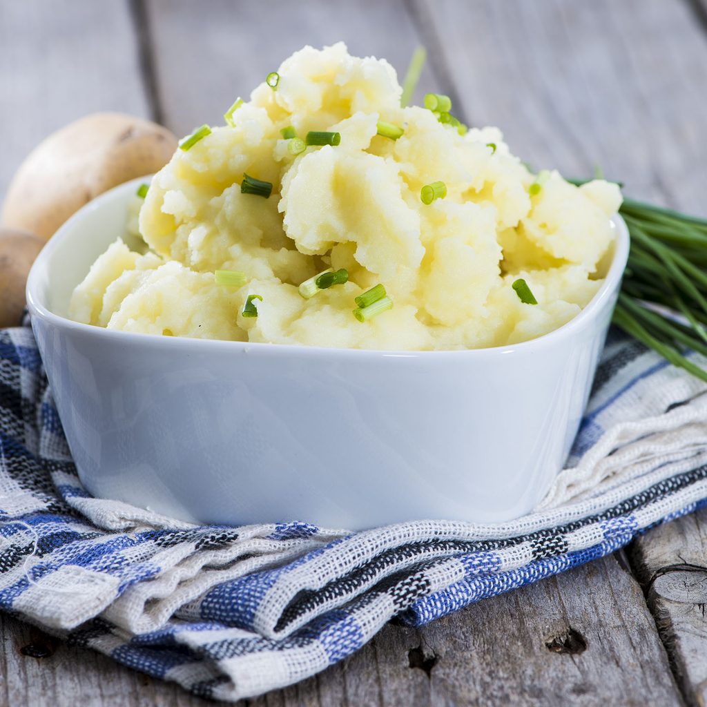 Bowl of mashed potatoes with chives