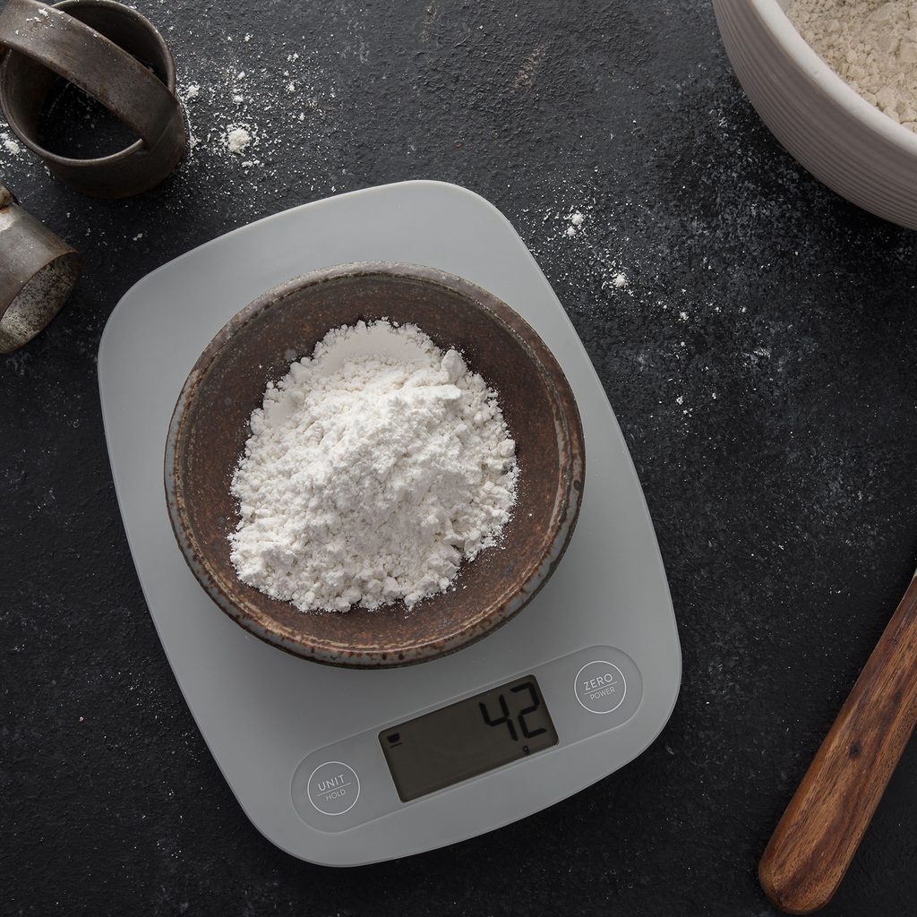 Bowl of flour on kitchen scale