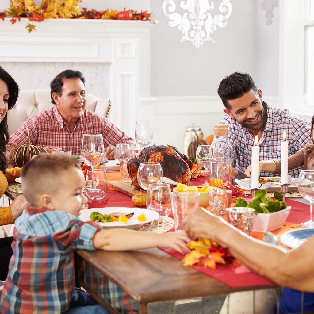 Family enjoying Thanksgiving dinner