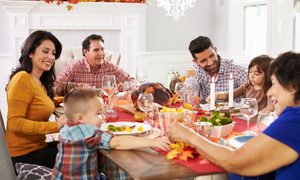 Family enjoying Thanksgiving dinner