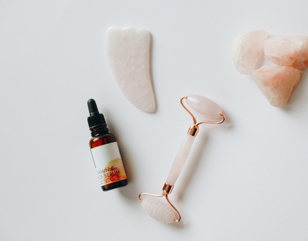 a flat lay of skincare products on white background