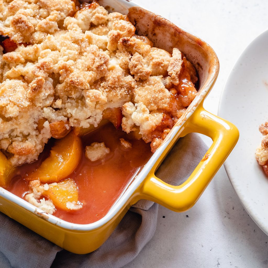 Peach cobbler in a baking dish