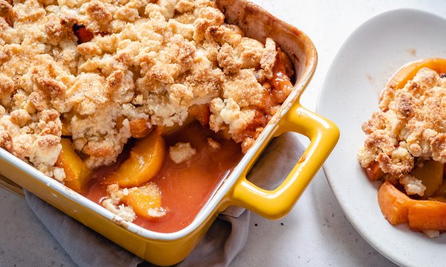 Peach cobbler in a baking dish