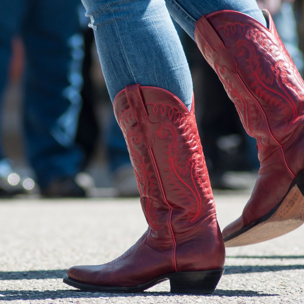 Person wearing red cowboy boots