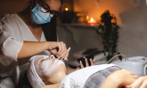 Woman receiving touchless facial