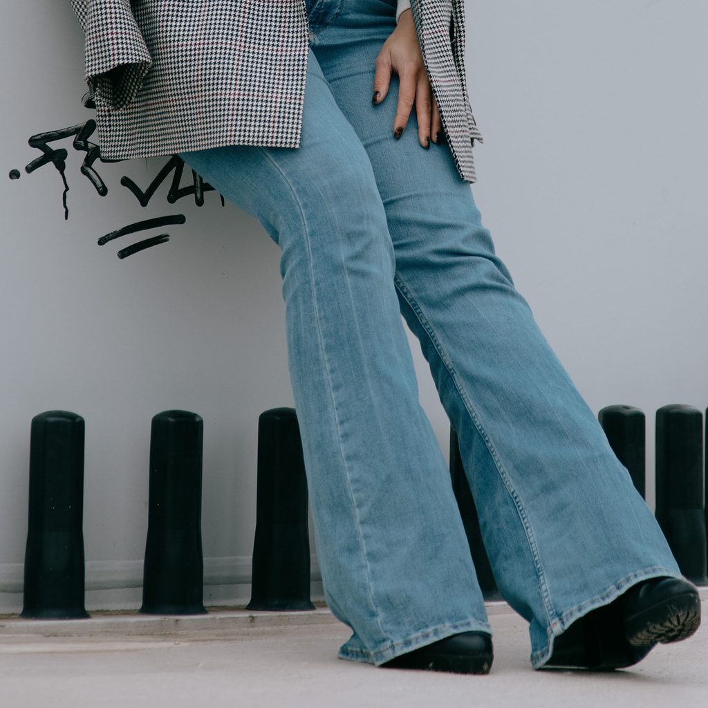 Woman wearing flared jeans
