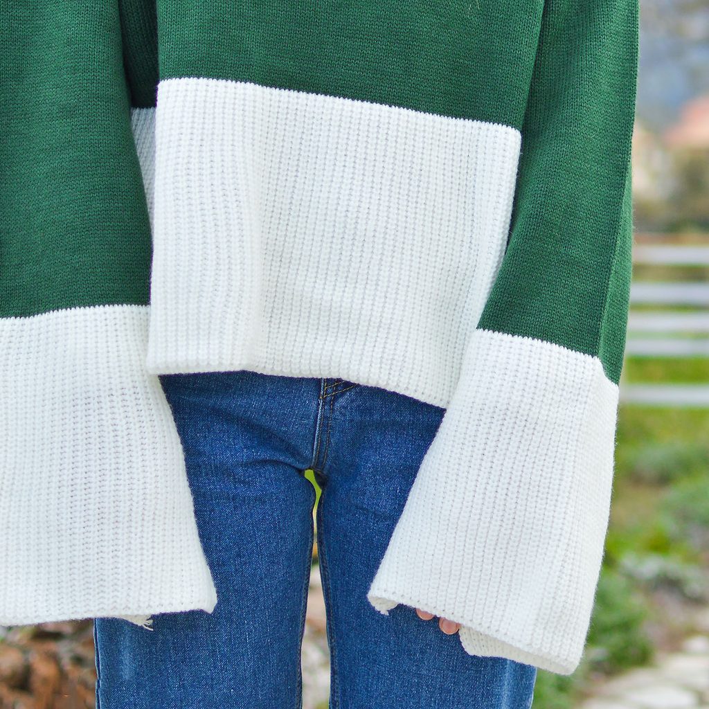 Woman wearing green and white color block sweater