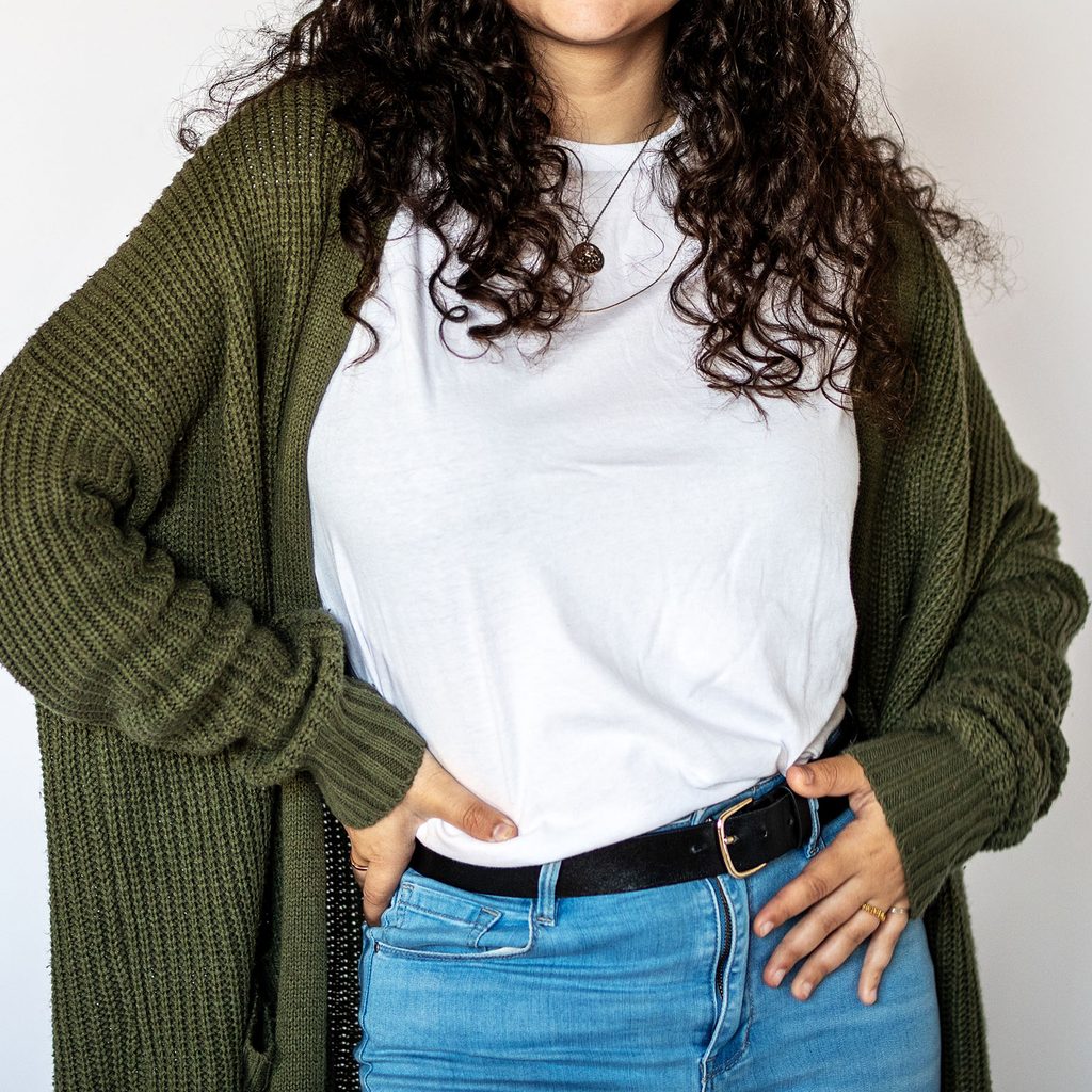 Woman wearing oversized cardigan