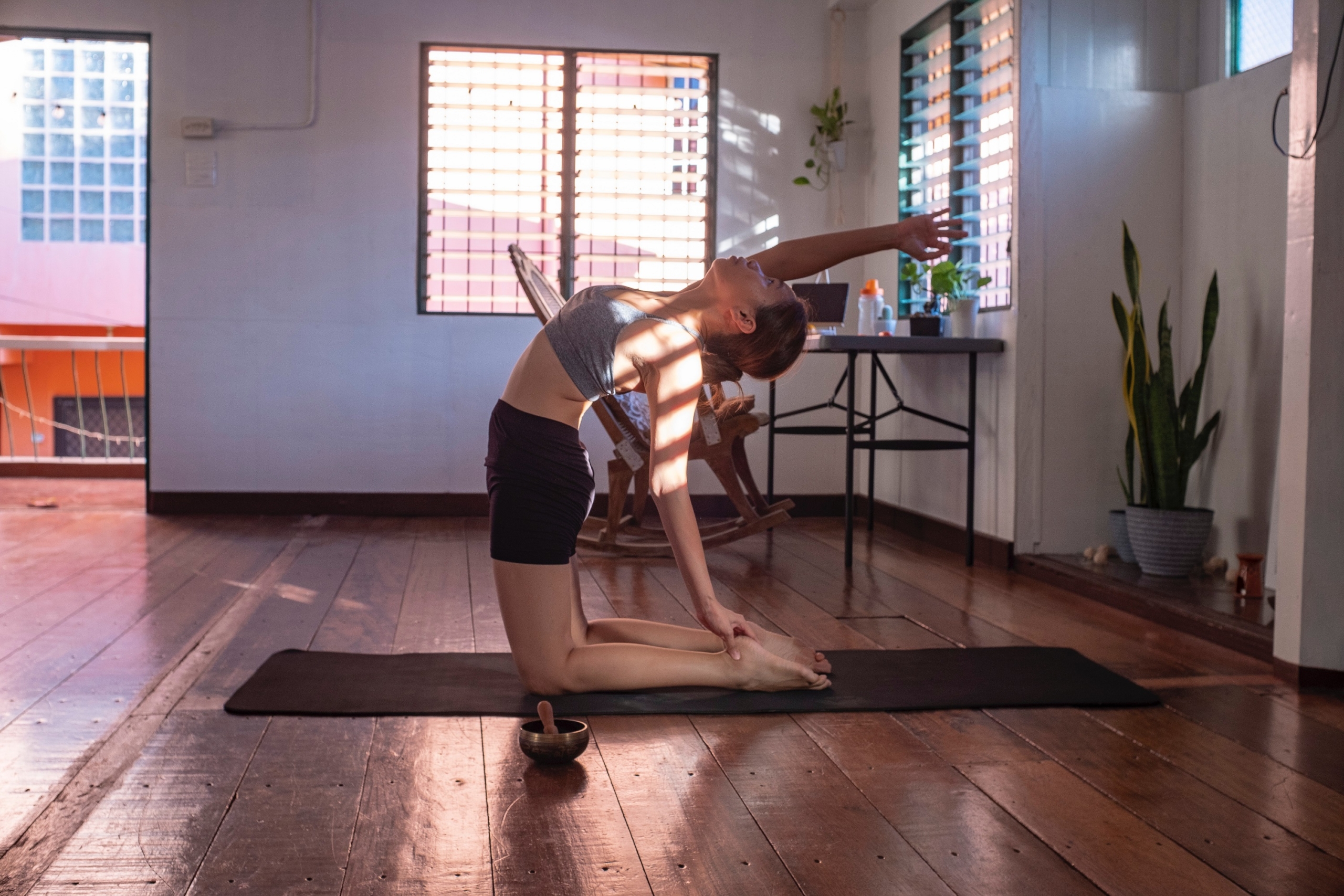 Woman in Black Shorts Doing Yoga