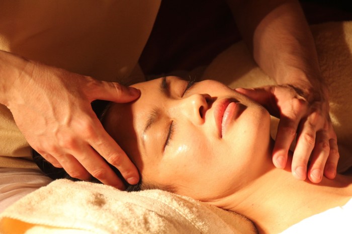Acupressure on Woman's Face and Neck