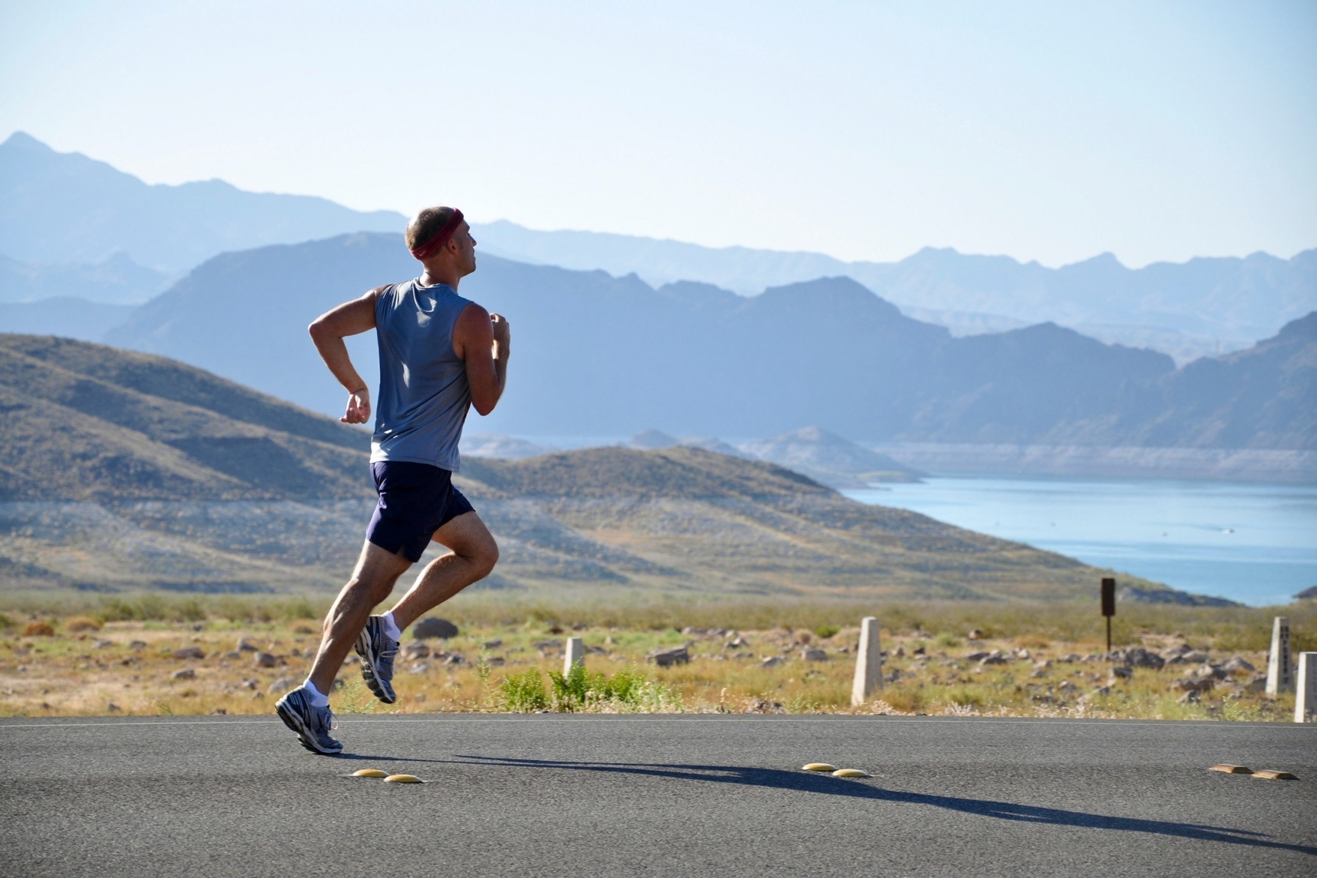 Man Running on the Side of the Road