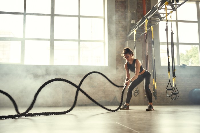 crossfit workout new year woman ropes gym jpg
