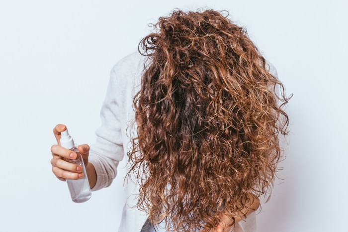 sea salt hair spray curly haired woman