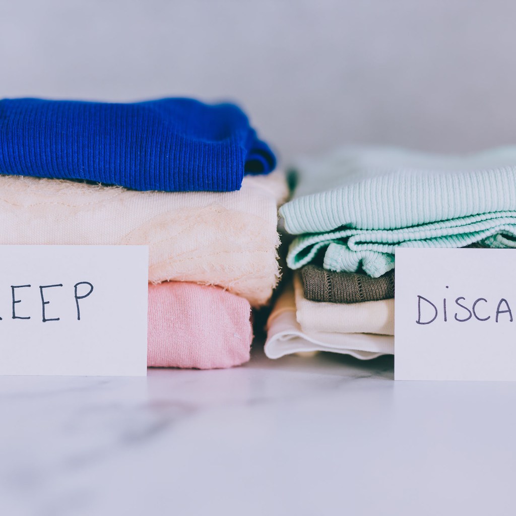 Sorting clothes into two piles