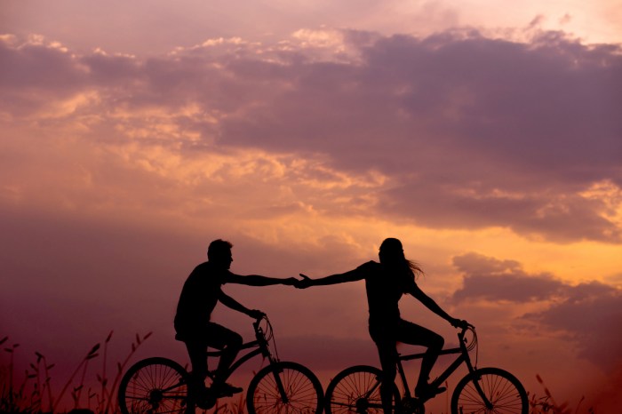A couple on bikes